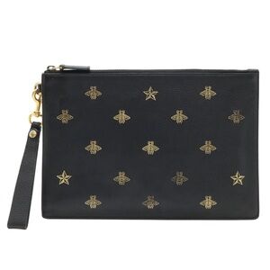 Gucci Black Pouch with Gold Bee and Star Details